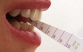Jaw opening measurement done on TMJ patient