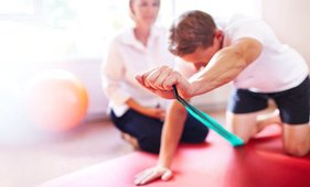 Patient preforming a band exercise