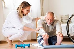 Patient stretching to touch his toes