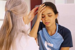 Athlete experiencing symptoms from a concussion