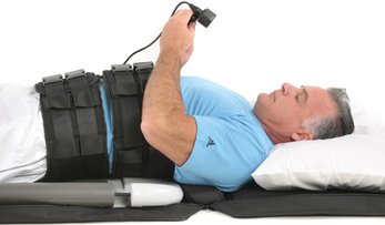 Lumbar Traction treatment on man