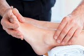 Stretching preformed on ankle by physical therapist