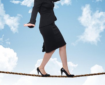 Woman balancing on rope